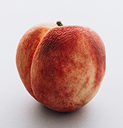 wrinkly peach on a white background
